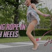 Julie Skyhigh Skipping Rope In C Louboutin High Heels Floating Dress